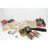 A group of worldwide banknotes and coinage together with a quantity of costume jewellery and watches