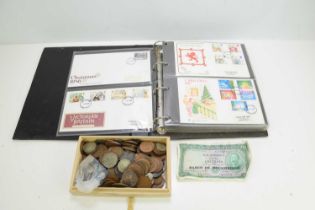 A quantity of GB and worldwide coinage, some silver, together with an album of First Day Covers.
