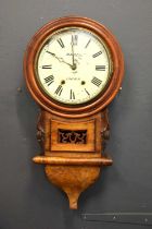 A 19th century walnut and mahogany cased drop dial wall clock with foliate carving, with pendulum