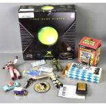 A boxed original X-Box games console together with a Star Trek toy communicator, a vintage Radica