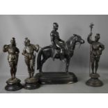 A set of three metalware medieval style soldiers, together with a sculpture of soldier on horseback.