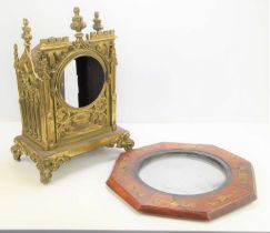 A 19th century Gothic Revival mantle clock case, the gilt metal with central circular aperture,