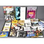 A group of Beatles memorabilia to include magazines, books and various albums including Revolver,