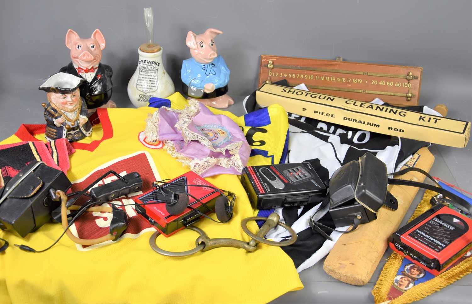 A group of collectable items to include vintage football shirt, Agfa camera, Sanyo personal