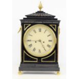 A Regency eight day bracket clock in an ebonised and brass inlaid case the eight inch Roman