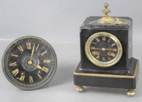 A 19th century French mantle clock the signed black dial with gilt Roman numerals, makers name