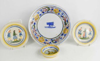 A group of French pottery, to include a pair of Quimper dishes, and small bowl.