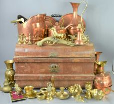 A metal trunk together with a quantity of brass and copper ware to include copper kettle, brass