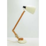 A 20th Century "Maclamp" adjustable anglepoise desk lamp designed by Terence Conran for Habitat.