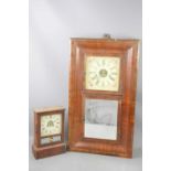 An early 20th century mahogany cased 8 day wall clock by E.N Welch USA, and a mantle clock with