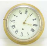 An early 20th century Air Ministry marked brass bulkhead clock, white dial with Roman numeral