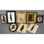 A selection of Victorian silhouettes, together with a verre eglomise portrait of a lady, and a