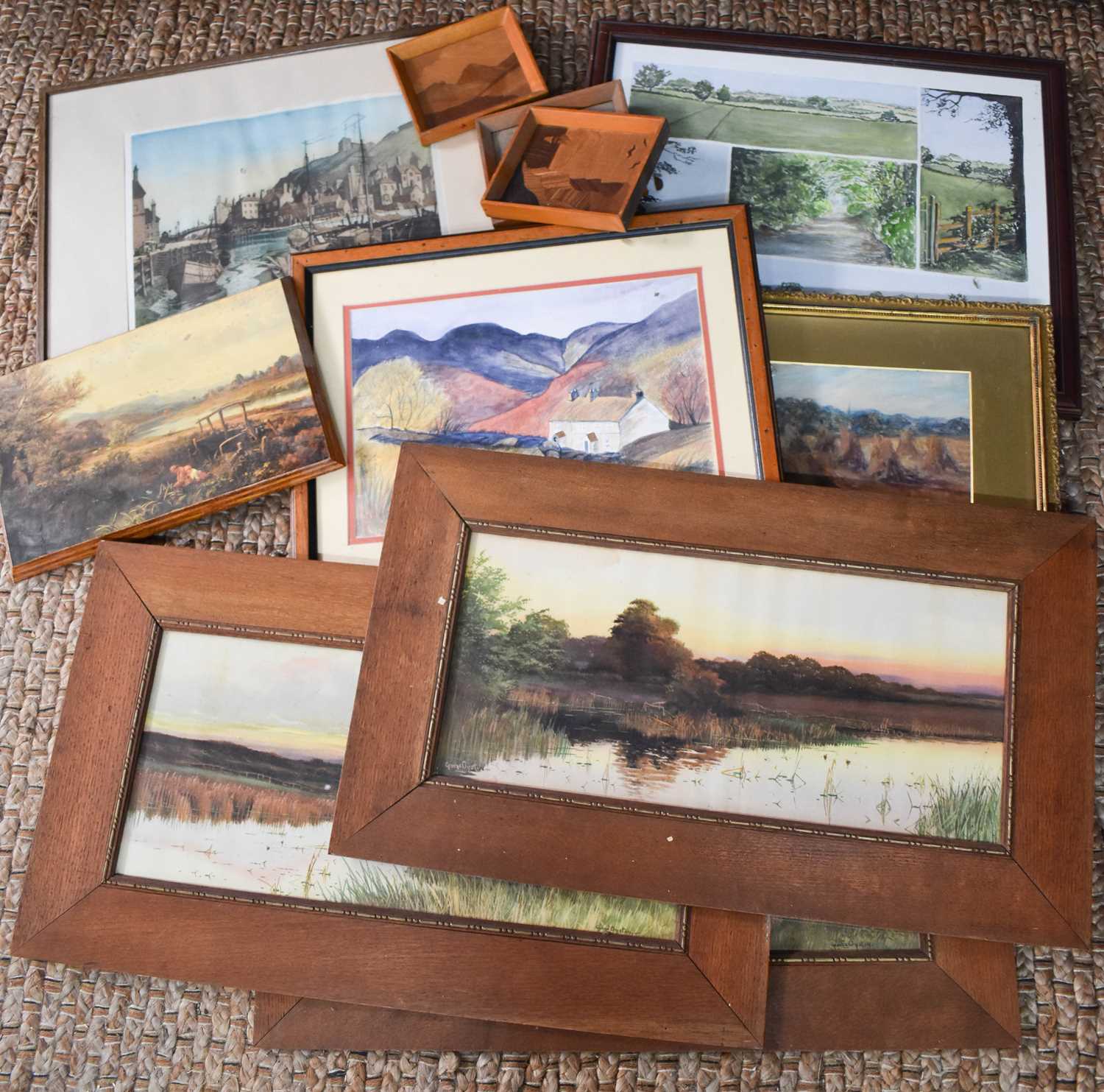 A group of pictures and prints, including a pair of landscape paintings.