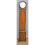 An early 20th century oak cased grandmother clock, with key and pendulum, 126cm tall