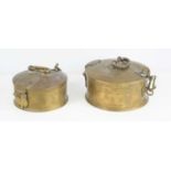 Two brass Indian chapati storage boxes, hand engraved geometric motifs to the top, the largest