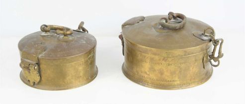 Two brass Indian chapati storage boxes, hand engraved geometric motifs to the top, the largest