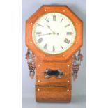 A 19th century oak cased drop dial wall clock, twin fusee movement, Roman numeral dial, mother of