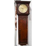 A 19th century oak cased drop dial wall clock by Brown, the circular brass Roman numeral dial with