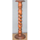 A mahogany jardiniere stand with barley twist centre, 98cm high.