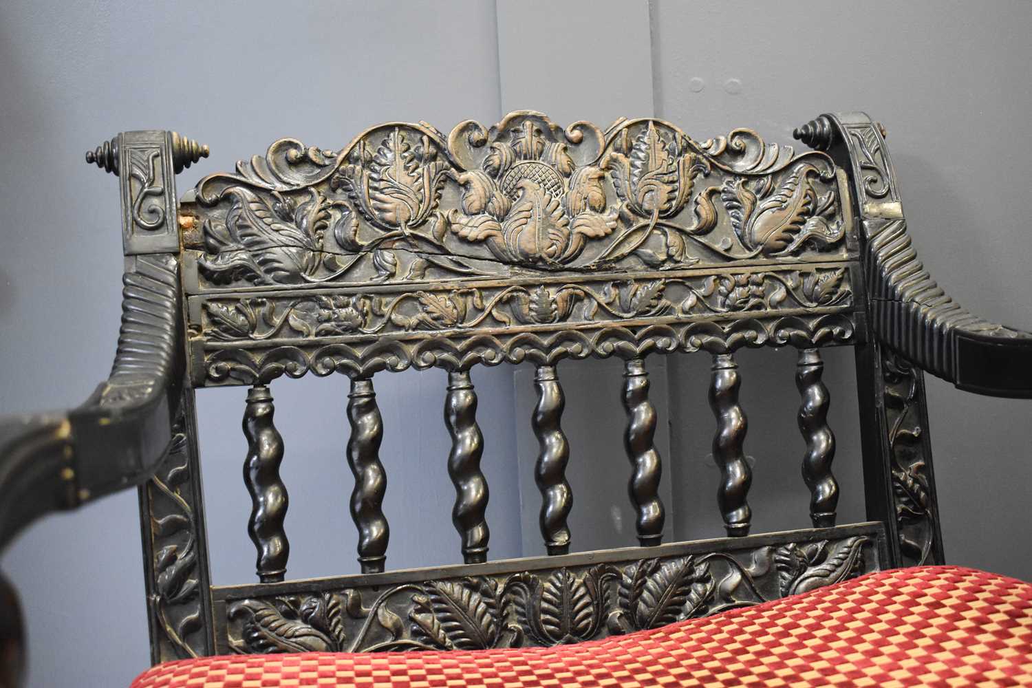 A pair of exeptional Anglo Indian ebony carved armchairs, circa 1840, Ceylonese, the shaped and - Image 6 of 9