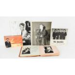 A 1950s autograph book containing photos and photographs of various actors and musicians, to include