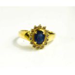 An 18ct gold, sapphire and diamond ring, size N, 4.13g