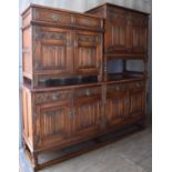 A group of Old Charm furniture, including long four door sideboard, two matching cupboards, and a