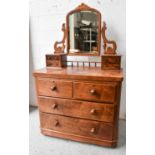 A Victorian mahogany dressing table, with mirrored back, the chest having two short over two long