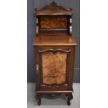 A 20th century mahogany cabinet, 40 yb 109 by 38cm.