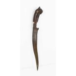 A 19th century East African Kris / knife, with carved wooden handle in the fomr of a Baboon and
