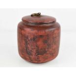 A Chinese terracotta jar and cover / tea canister with contents (lid sealed), the body engraved with