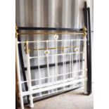 A Victorian brass bed, painted white, together with the ironwork frame. 137cms wide by 202cms long