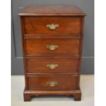 A mahogany chest of four short drawers, with brass handles, 80cm high.