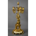 A 19th century French ormolou candleabra, with five branches, removable candle sockets, and a cherub