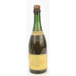 A bottle of vintage Veuve Cliquot champagne 1937, stamped across the front Reserved for the Allied