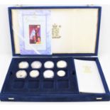 A group of Royal Mint "Golden Wedding Anniversary" silver proof coins with 22ct gold cameo, with