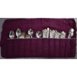 A group of silver plated flatware, two boxed silver platedfish sets together with a pocket watch and