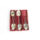 A set of six silver golfing spoons with golf club ends, 1.87toz.