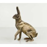 A solid silver hare, engraved with fine detail, makers initials A.E.J., Birmingham 1982, 5.44toz.