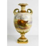 A fine early Royal Worcester vase by John Stinton, painted with Highland cattle in a Loch scene, the