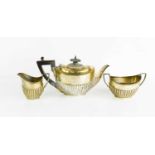 A silver tea for one, including tea pot, milk jug and sugar bowl, 6.69toz.