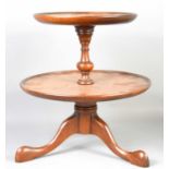 An early 20th century Edwardian mahogany apprentice piece circular dumb waiter, with two tiers,