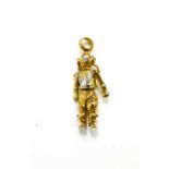 A 9ct gold articulated deep sea diver pendant, set with diamonds, 10.44g.