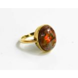A 9ct gold and fire opal ring, size O, 4.2g.