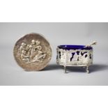 A Dutch silver trinket box, the lid embossed with Cherubs and the body decorated with scroll work,