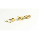 A pair of 9ct gold cufflinks, and matching collar stud.