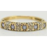 A 9ct gold and five stone diamond ring, 1.6g