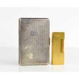 A white metal cigarette case together with a Dunhill gold coloured lighter.