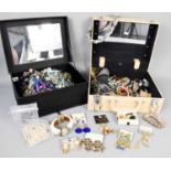 Two jewellery boxes, including a large quantity of jewellery; earrings, necklaces, pairs of earrings