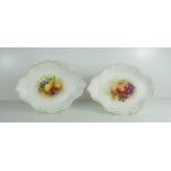 A pair of Royal Worcester lozenge shape dishes by F Roberts, painted with fruit, puce mark circa